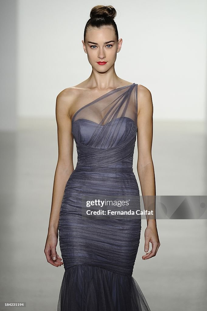 A model attends the Kenneth Pool Fall 2014 Bridal collection show at ...