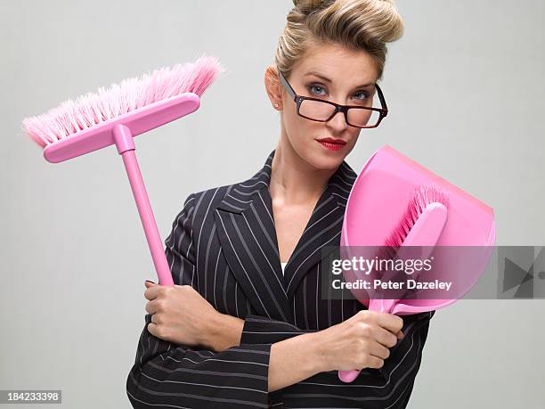 contract cleaner businesswoman - dustpan and brush stockfoto's en -beelden