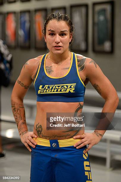 Raquel Pennington celebrates after defeating Jessamyn Duke after their preliminary fight during filming of season eighteen of The Ultimate Fighter on...