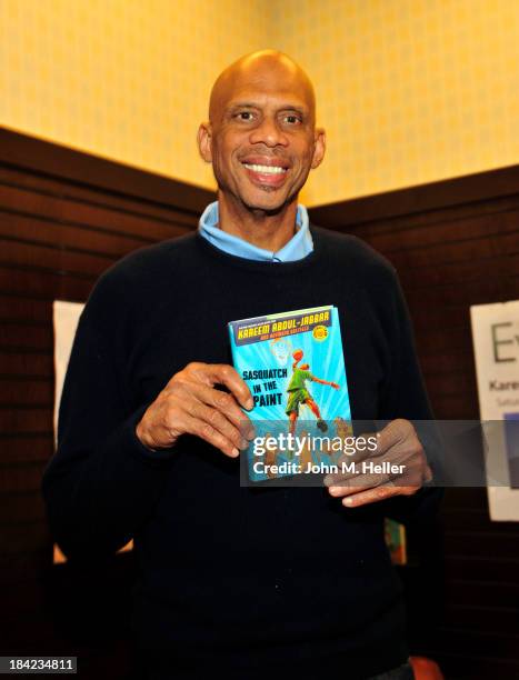 Former NBA Star Kareem Abdul Jabbar signs copies of his new book "Sasquatch In The Paint" at the Barnes & Noble bookstore at The Grove on October 12,...