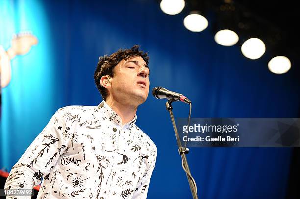 Edward Droste and Grizzly Bear perform during CBGB Music & Film Festival 2013 at Times Square on October 12, 2013 in New York City.