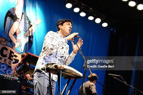 Edward Droste and Grizzly Bear perform during CBGB Music & Film Festival 2013 at Times Square on October 12, 2013 in New York City.