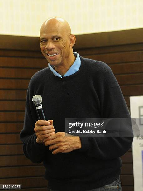 Kareem Abdul Jabbar signs copies of his new children's book "Sasquatch In The Paint" at Barnes & Noble bookstore at The Grove on October 12, 2013 in...