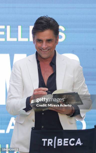 Actor/author John Stamos attends the Tribeca Storytellers: John Stamos at the Tribeca Music Lounge during Art Basel Miami Beach at Miami Beach...