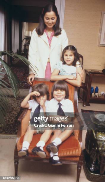 Isabel Preysler, wife of Spanish singer Julio Iglesias, with her three children: Chaveli, and Enrique and Julio Madrid, Castilla La Mancha, Spain. .