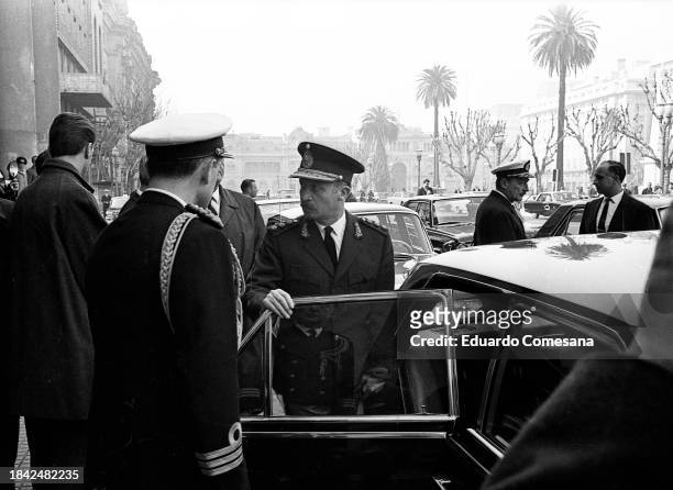 Argentine General & de facto President of Argentina Juan Carlos Onganía steps into his car as he leaves the Metropolitan Cathedral, Buenos Aires,...