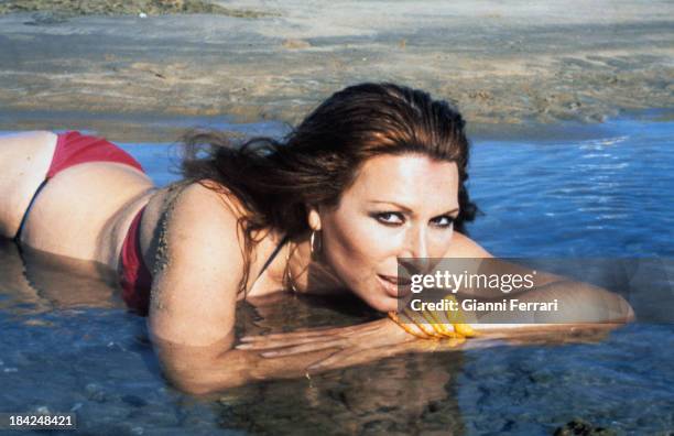 The Spanish singer Rocio Jurado in the pool at her house Madrid, Castilla La Mancha, Spain. .