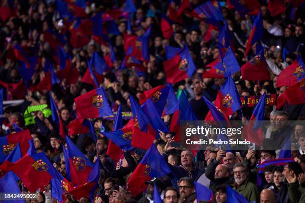 Fans of FC Barcelona waves their flags ahead the Group H - UEFA Champions League match between FC Barcelona and FC Porto at Estadi Olimpic Lluis...