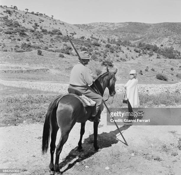 The Italian actress Virna Lisi with the bullfighter Luis Miguel Dominguin, on his farm of 'Villa Paz' Cuenca, Castilla La Mancha, Spain. .