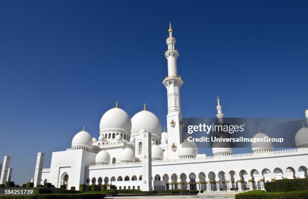 The beautiful white Sheikh Zayed Grand Mosque in Abu Dhabi in the UAE the worlds 8th largest Muslim mosque in the world in United Arab Emirates.