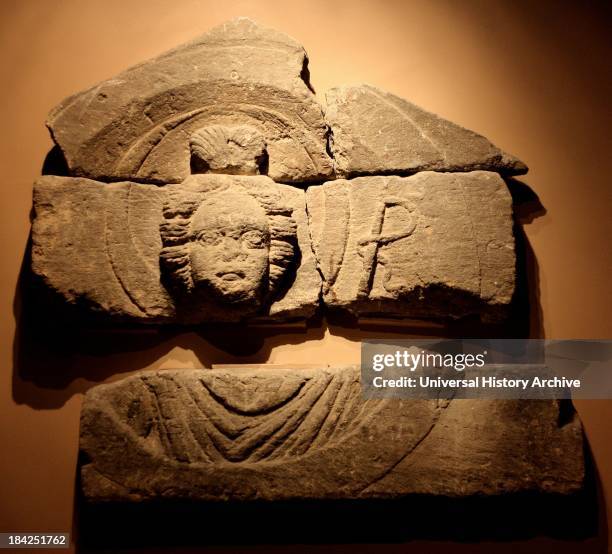 Carvings of Luna and Sol taken from pediments that were found in the temple courtyard in aquae Sulis, in the Roman city of Bath, England. They are...