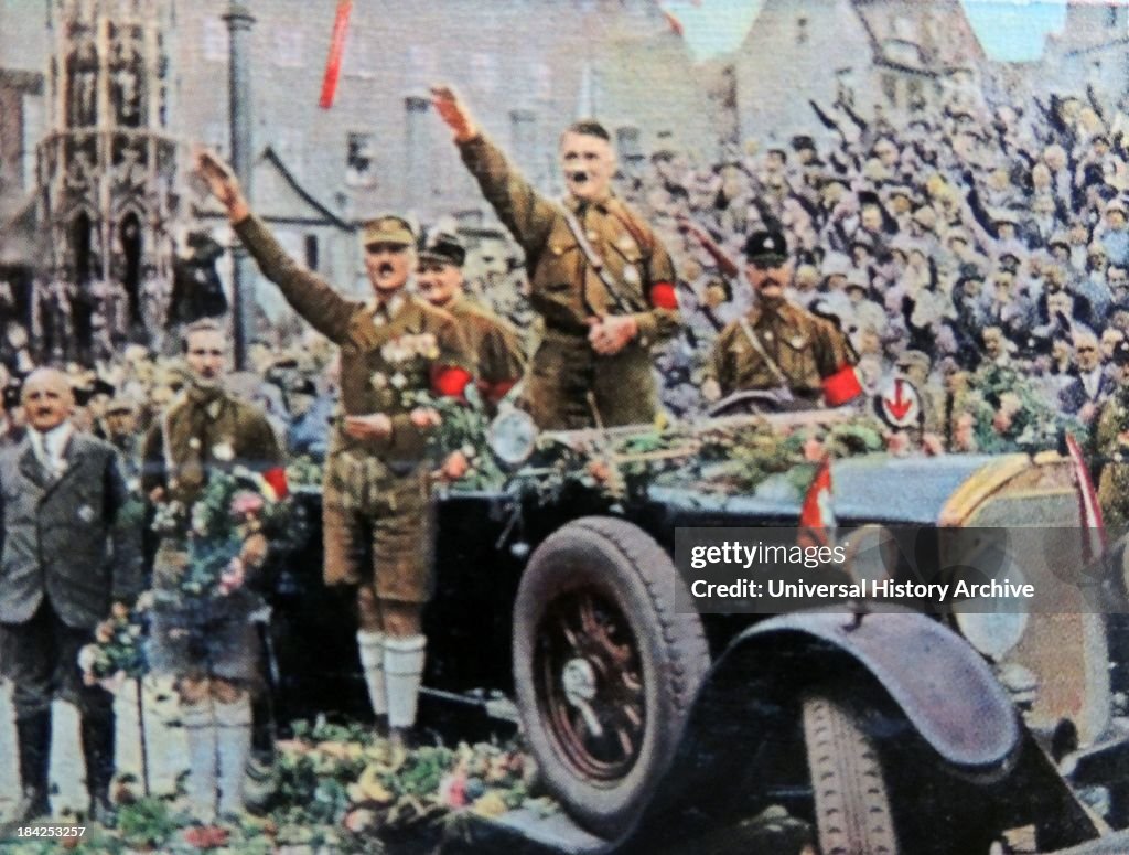 Ww2 Hitler Rally Hitler attending a Nazi Party rally in Nuremberg, standing to salute ...