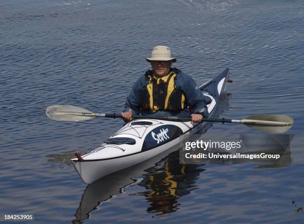 Old man in a kayak, UK.