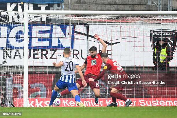 Marc-Oliver Kempf of Hertha Berlin scores his team's second goal past Nikola Soldo of 1. FC Kaiserslautern during the Second Bundesliga match between...