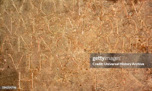 Fragment from an Roman gravestone. Inscribed in Latin with: "To the spirits of the departed, Mercatilla, freedwoman and foster-daughter of Magnius....