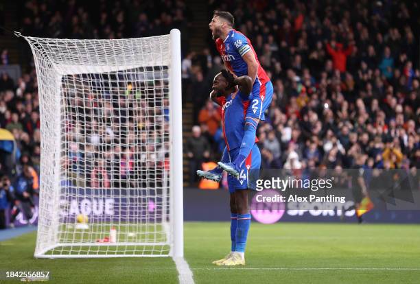 Jean-Philippe Mateta of Crystal Palace celebrates scoring his team's first goal with teammate Joel Ward during the Premier League match between...