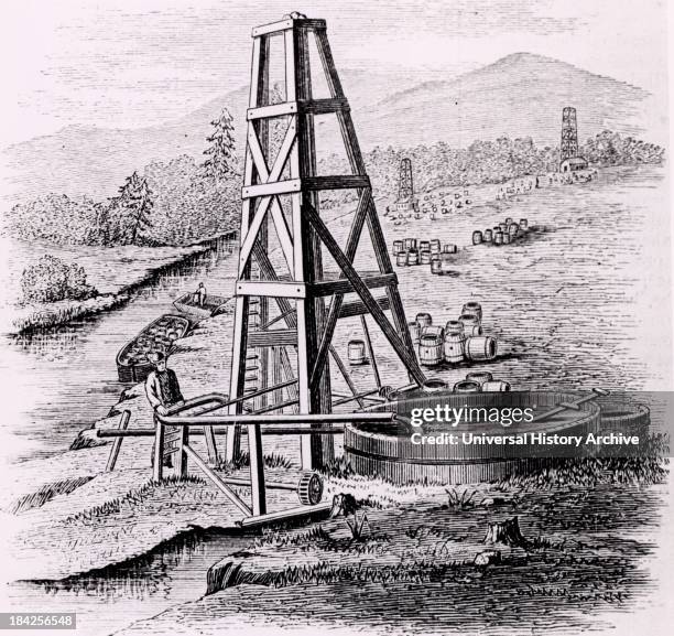 Oil wells at Oil Creek, 150 miles up the Allegheny River from Pittsburgh, Pennsylvania, USA. Engraving from "The Practical Dictionary of Mechanics"...