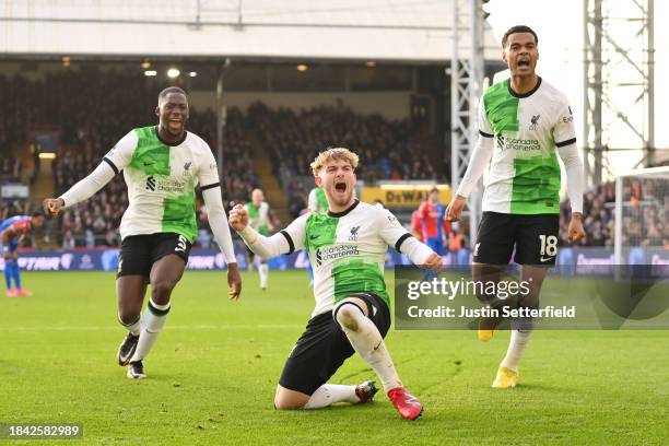 Harvey Elliott of Liverpool celebrates with Ibrahima Konate and Cody Gakpo after scoring his team's second goal during the Premier League match...