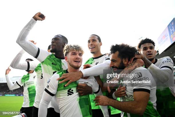 Harvey Elliott of Liverpool celebrates with team mates after scoring his team's second goal during the Premier League match between Crystal Palace...