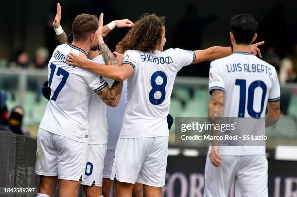 Mattia Zaccagni of SS Lazio celebrates a opening goal with his team mates during the Serie A TIM match between Hellas Verona FC and SS Lazio at...