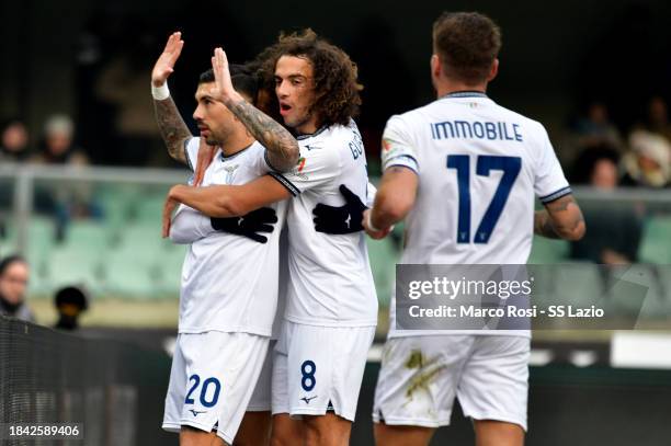 Mattia Zaccagni of SS Lazio celebrates a opening goal with his team mates during the Serie A TIM match between Hellas Verona FC and SS Lazio at...