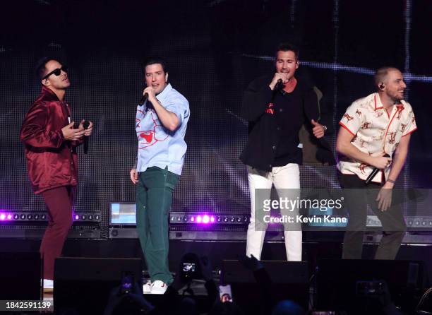 Members of Big Time Rush perform on stage at Madison Square Garden on December 08, 2023 in New York City.