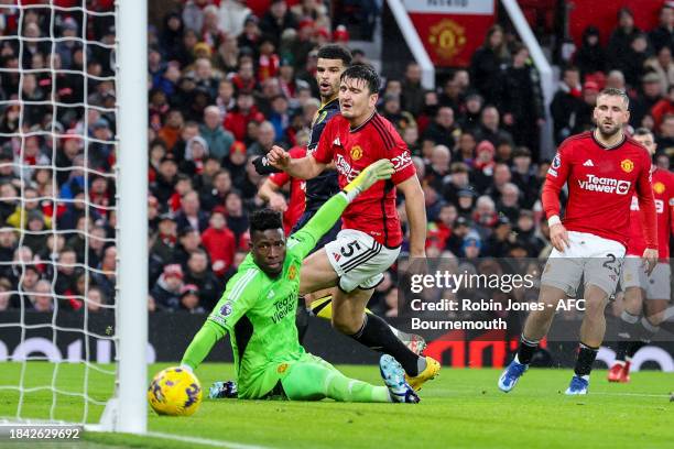 Dominic Solanke of Bournemouth beats André Onana of Manchester United and scores a goal to make it 1-0 during the Premier League match between...