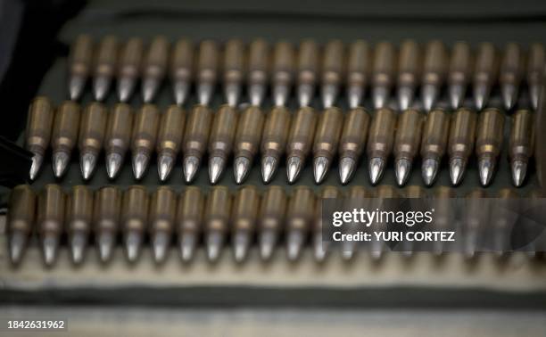 Rifle ammunition sized by Mexican marines soldiers to alleged drug traffickers of the Zetas drug cartel are presented together with hand grenades,...