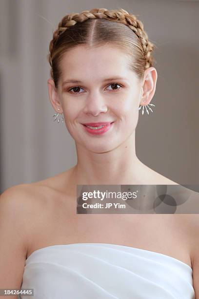 Model poses backstage before the Naeem Khan Fall/Winter 2014 Bridal collection presentation and reception on October 12, 2013 in New York City.