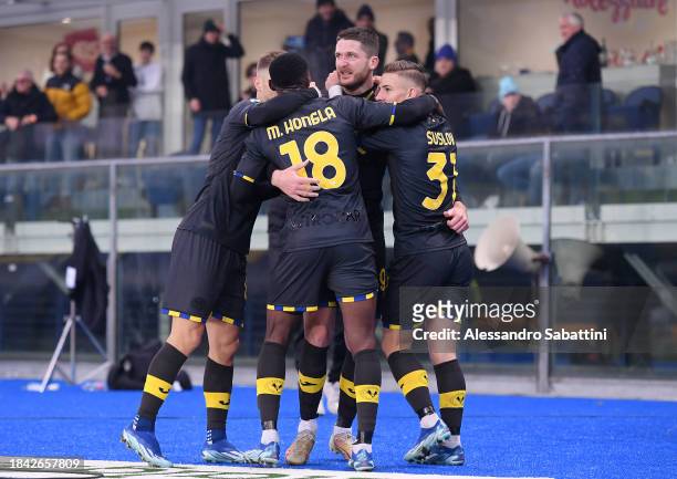Thomas Henry of Hellas Verona FC celebrates with teammates scoring their team's first goal during the Serie A TIM match between Hellas Verona FC and...
