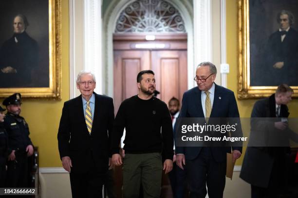 Walking with Senate Minority Leader Mitch McConnell and Senate Majority Leader Chuck Schumer , Ukrainian President Volodymyr Zelensky arrives at the...
