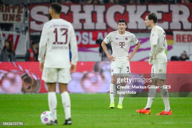 Eric Maxim Choupo-Moting, Min-jae Kim and Leon Goretzka of Munich looking dejected during the Bundesliga match between Eintracht Frankfurt and FC...
