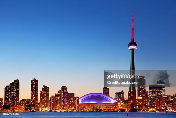 colorful toronto cityscape at sunset - toronto stock pictures, royalty-free photos & images