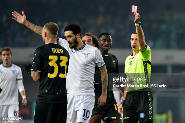 The referee Giovanni Ayroldi shows a red card to Ondrej Duda of Hellas Verona during the Serie A TIM match between Hellas Verona FC and SS Lazio at...