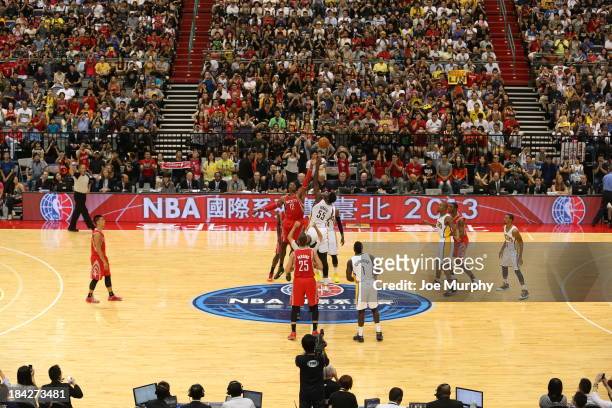 Here is the opening tip where the Houston Rockets take on the Indiana Pacers during the 2013 Global Games on October 13, 2013 at the Taipei Arena in...