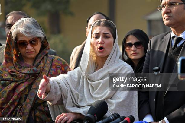 Mehar Bano , daughter of jailed former Pakistan's foreign minister Shah Mahmood Qureshi, speaks with media outside the Adiala Jail in Rawalpindi on...