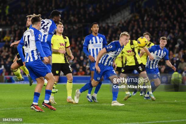 Simon Adingra of Brighton & Hove Albion scores their team's first goal during the Premier League match between Brighton & Hove Albion and Burnley FC...