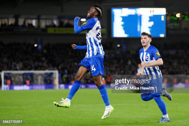 Simon Adingra of Brighton & Hove Albion celebrates scoring their team's first goal during the Premier League match between Brighton & Hove Albion and...