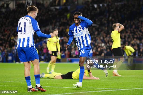 Simon Adingra of Brighton & Hove Albion celebrates scoring their team's first goal during the Premier League match between Brighton & Hove Albion and...