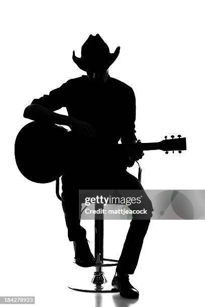 country and western silhouette - guitar player silhouette stock pictures, royalty-free photos & images