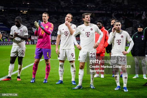 Dayot Upamecano, Manuel Neuer, Harry Kane, Thomas Mueller and Raphael Guerreiro of Munich looking dejected after the Bundesliga match between...