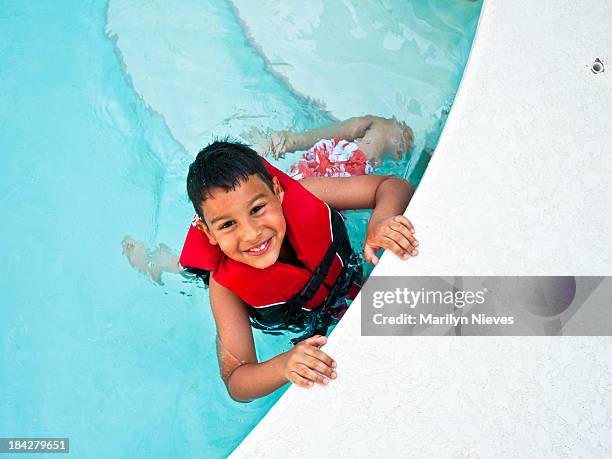 cute boy swimming - life jacket stock pictures, royalty-free photos & images