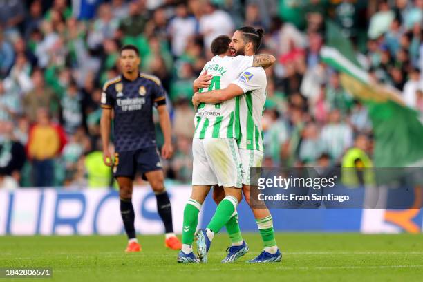 Aitor Ruibal of Real Betis celebrates scoring their team's first goal with team mate Isco during the LaLiga EA Sports match between Real Betis and...