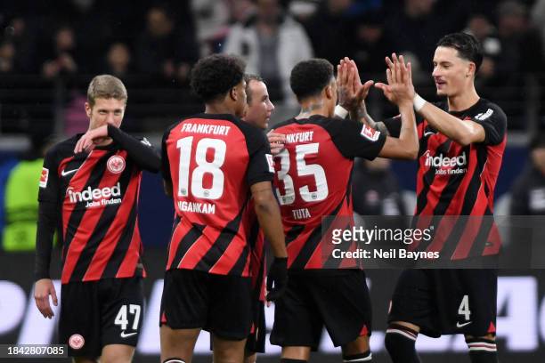 Players of Eintracht Frankfurt celebrate following the team's victory during the Bundesliga match between Eintracht Frankfurt and FC Bayern München...