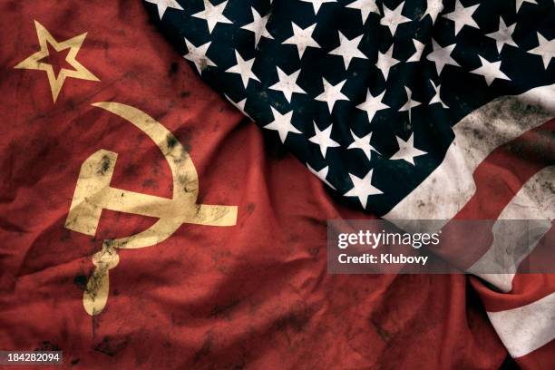 grungy flags of soviet union and usa - russian culture stock pictures, royalty-free photos & images