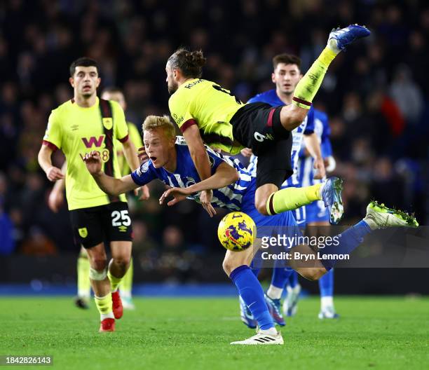 Jan Paul van Hecke of Brighton & Hove Albion is challenged by Jay Rodriguez of Burnley during the Premier League match between Brighton & Hove Albion...