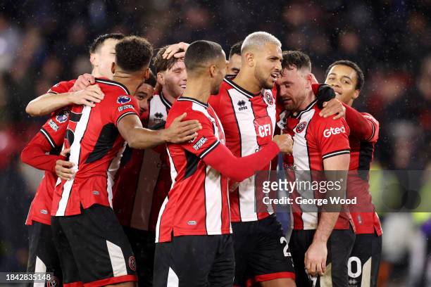 The Sheffield United team celebrate at the final whistle of the Premier League match between Sheffield United and Brentford FC at Bramall Lane on...