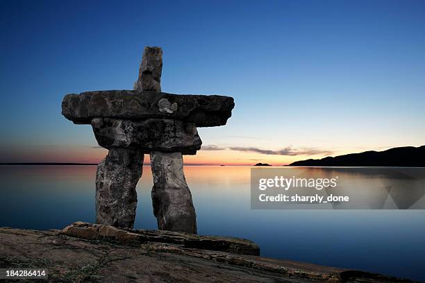 xl inukshuk twilight - north american tribal culture stock pictures, royalty-free photos & images