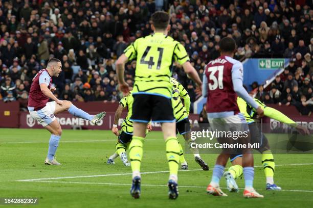 John McGinn of Aston Villa scores their team's first goal during the Premier League match between Aston Villa and Arsenal FC at Villa Park on...