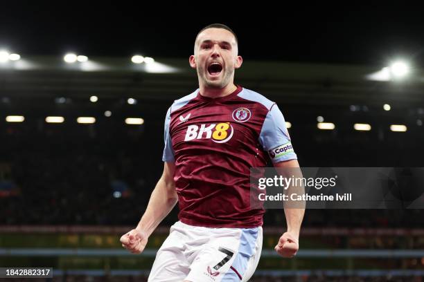 John McGinn of Aston Villa celebrates scoring their team's first goal during the Premier League match between Aston Villa and Arsenal FC at Villa...